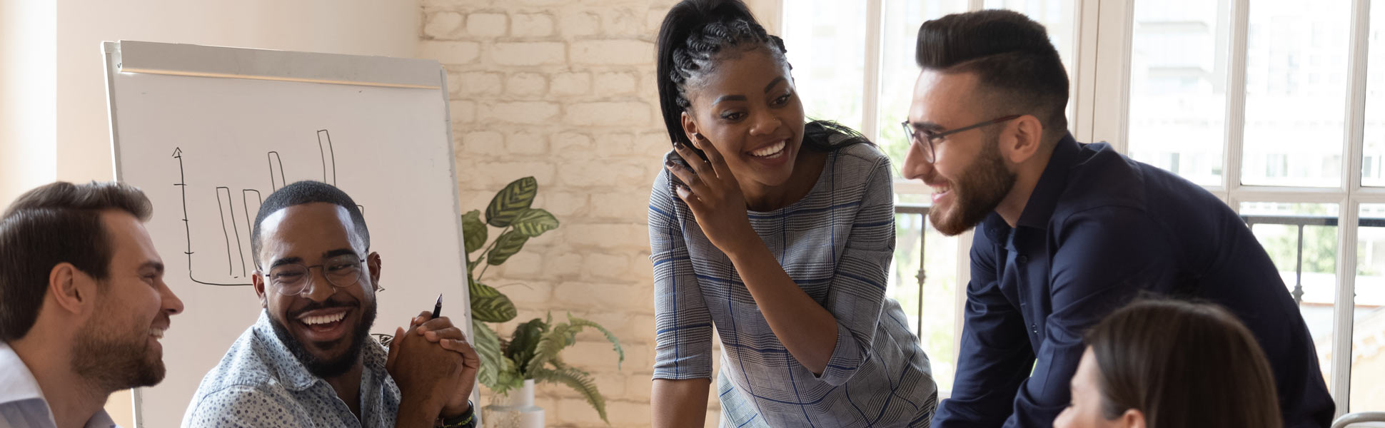 Coworkers In A Meeting Smiling