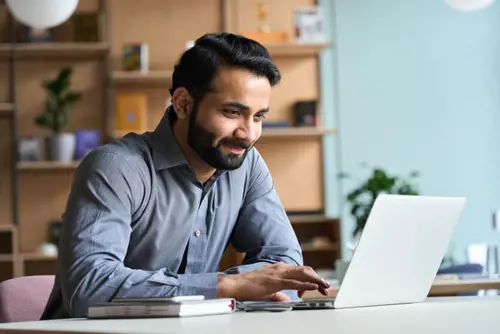 Man Looking At Laptop
