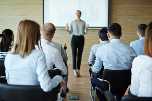 woman presenting to class