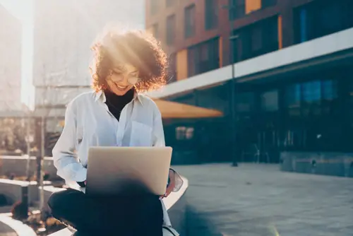Woman Signing Up Laptop