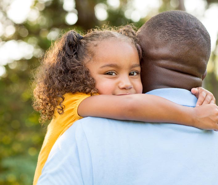 Man Holding Child